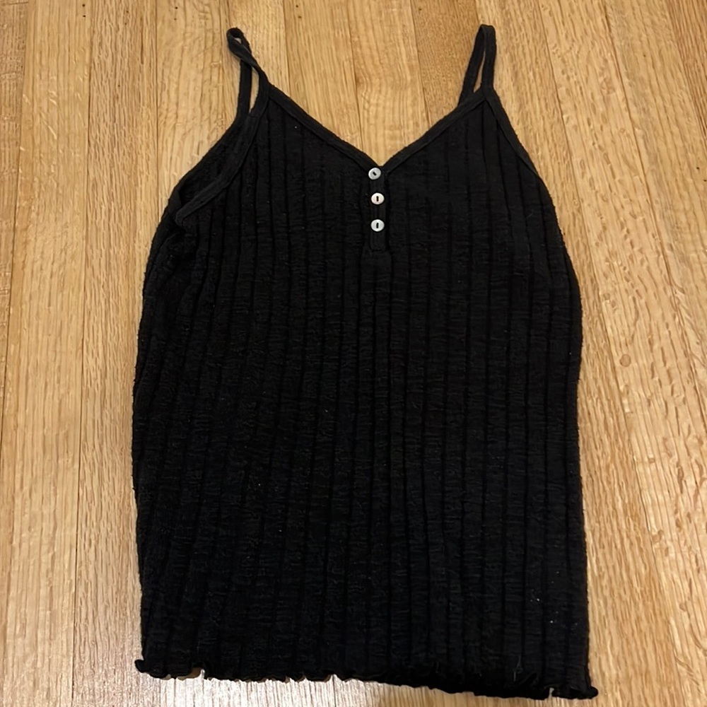 Brand is art class bought from Target, size a kids large 10/12, color is black.